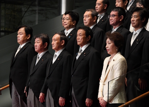 Japan's new cabinet reflects PM's focus on gender and defence